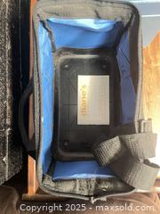 MaxSold Auction: Lot: Soft-Sided Tool/Utility Bag & Hard Metal Storage Case with plug in and leather bag.  - Cobourg (Ontario, Canada) SELLER MANAGED Reseller Online Auction - Spragge Crescent
