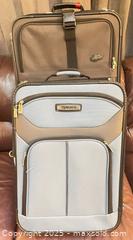 MaxSold Auction: Two Soft-Sided Upright Rolling Suitcases — Black & Light Blue - Cobourg (Ontario, Canada) SELLER MANAGED Reseller Online Auction - Spragge Crescent