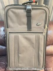 MaxSold Auction: Two Soft-Sided Upright Rolling Suitcases — Black & Light Blue - Cobourg (Ontario, Canada) SELLER MANAGED Reseller Online Auction - Spragge Crescent