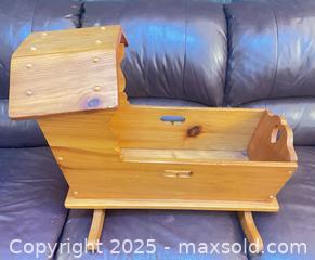 MaxSold Auction: Wooden Rocking Doll Cradle with Canopy and Cutout Handles - Cobourg (Ontario, Canada) SELLER MANAGED Reseller Online Auction - Spragge Crescent