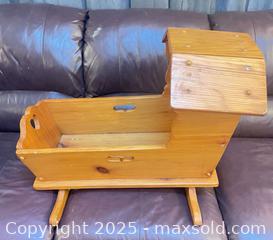 MaxSold Auction: Wooden Rocking Doll Cradle with Canopy and Cutout Handles - Cobourg (Ontario, Canada) SELLER MANAGED Reseller Online Auction - Spragge Crescent