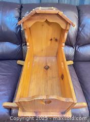 MaxSold Auction: Wooden Rocking Doll Cradle with Canopy and Cutout Handles - Cobourg (Ontario, Canada) SELLER MANAGED Reseller Online Auction - Spragge Crescent