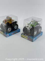 MaxSold Auction: 2 Mini Monster Trucks – 4WD Friction   - Upland (California, USA) SELLER MANAGED Reseller Online Auction - Monte Vista