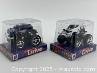MaxSold Auction: 2 Mini Monster Trucks – Pull-Back / Friction Drive – New in Box  - Upland (California, USA) SELLER MANAGED Reseller Online Auction - Monte Vista