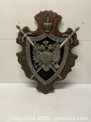 MaxSold Auction: Decorative Wall Plaque with Swords & Double-Headed Eagle Crest (Approx. 32”) - Vancouver (British Columbia, Canada) SELLER MANAGED Reseller Online Auction - East 7th Avenue (STORAGE)