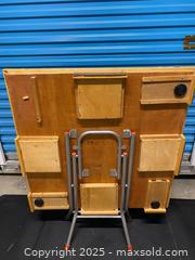 MaxSold Auction: Folding game table with green playing surface - Vancouver (British Columbia, Canada) SELLER MANAGED Reseller Online Auction - East 7th Avenue (STORAGE)