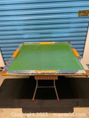 MaxSold Auction: Folding game table with green playing surface - Vancouver (British Columbia, Canada) SELLER MANAGED Reseller Online Auction - East 7th Avenue (STORAGE)