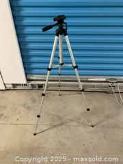 MaxSold Auction: Lightweight Aluminum Camera Tripod with Pan/Tilt Head & Bubble Level  - Vancouver (British Columbia, Canada) SELLER MANAGED Reseller Online Auction - East 7th Avenue (STORAGE)