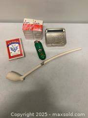 MaxSold Auction: Vintage Smoking Accessories Lot (Clay Pipe, Cigarette Roller, Matches & More)  - Vancouver (British Columbia, Canada) SELLER MANAGED Reseller Online Auction - East 7th Avenue (STORAGE)