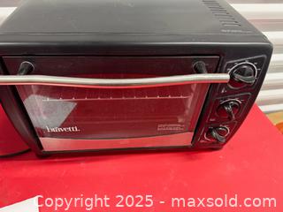 MaxSold Auction: Panasonic Microwave and bravetti toaster oven  - Toronto (Ontario, Canada) SELLER MANAGED Downsizing Online Auction - Jane Street (STORAGE)