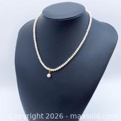 MaxSold Auction: 18K Akoya Cultured Pearl Necklace with Single Pearl Pendant  - Vancouver (British Columbia, Canada) SELLER MANAGED Downsizing Online Auction - W20th Avenue (CONDO)