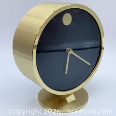 MaxSold Auction: Howard Miller MCM Brass-Plated Museum-Style Table Clock - Vancouver (British Columbia, Canada) SELLER MANAGED Downsizing Online Auction - W20th Avenue (CONDO)