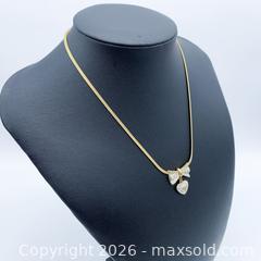 MaxSold Auction: Mario Valentino Gold Plated Bow Pendant Necklace 16-inch - Vancouver (British Columbia, Canada) SELLER MANAGED Downsizing Online Auction - W20th Avenue (CONDO)