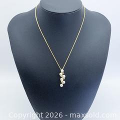 MaxSold Auction: Yellow Gold-Tone Pearl Pendant Necklace with CZ Accents - Vancouver (British Columbia, Canada) SELLER MANAGED Downsizing Online Auction - W20th Avenue (CONDO)