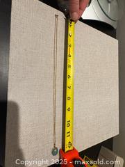 MaxSold Auction: 14kt gold necklace with green stone pendant  - Elgin (Ontario, Canada) SELLER MANAGED Estate Sale Online Auction - Main Street