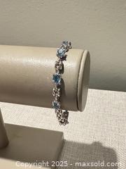 MaxSold Auction: 18kt white gold blue stones bracelet  - Elgin (Ontario, Canada) SELLER MANAGED Estate Sale Online Auction - Main Street