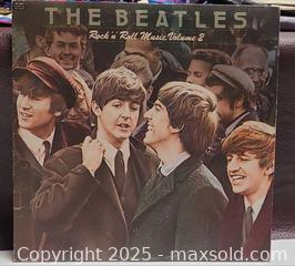 MaxSold Auction: Lot of 2 12" Vinyl LPs: The Beatles & Paul McCartney & Wings - Toronto (Ontario, Canada) PARTNER MANAGED Reseller Online Auction - Queen Street West
