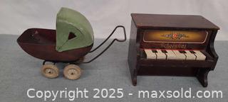 MaxSold Auction: Lot of 2 Vintage Toys: Schoenhut Toy Piano & Metal Baby Carriage - Toronto (Ontario, Canada) PARTNER MANAGED Reseller Online Auction - Queen Street West