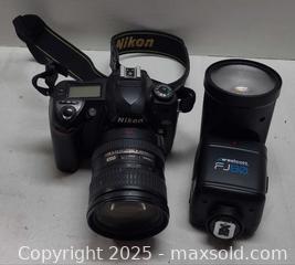 MaxSold Auction: Nikon DSLR Bundle with VR Zoom Lens and Westcott FJ80 Flash - Toronto (Ontario, Canada) PARTNER MANAGED Reseller Online Auction - Queen Street West