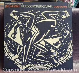 MaxSold Auction: Snake Charmer — Jah Wobble, The Edge &#38; Holger Czukay (12&#34; LP) - Toronto (Ontario, Canada) PARTNER MANAGED Reseller Online Auction - Queen Street West