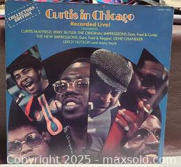 MaxSold Auction: Two Vintage 12&#34; Vinyl LPs: Donny Hathaway Live; Curtis in Chicago - Toronto (Ontario, Canada) PARTNER MANAGED Reseller Online Auction - Queen Street West
