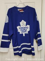 MaxSold Auction: Toronto Maple Leafs Jersey Signed by Tie Domi - Toronto (Ontario, Canada) SELLER MANAGED Downsizing Online Auction - McAdam Avenue