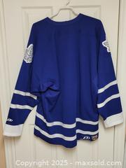 MaxSold Auction: Toronto Maple Leafs Jersey Signed by Tie Domi - Toronto (Ontario, Canada) SELLER MANAGED Downsizing Online Auction - McAdam Avenue