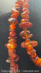 MaxSold Auction: Extra long Baltic amber necklace  - Markham (Ontario, Canada) PARTNER MANAGED Downsizing Online Auction - Loring Crescent