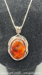 MaxSold Auction: Sterling silver Baltic amber pendant and earrings set - Markham (Ontario, Canada) PARTNER MANAGED Downsizing Online Auction - Loring Crescent