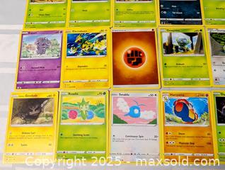 MaxSold Auction: POKEMON CARD LOT AND PROTECTIVE SLEEVES - Kingston (Ontario, Canada) SELLER MANAGED Downsizing Online Auction - Rosemund Crescent