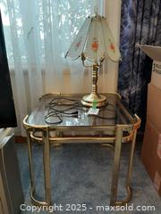 MaxSold Auction: 1970s Hollywood Regency brass and smoked glass side table and floral touch lamp - London (Ontario, Canada) PARTNER MANAGED Estate Sale Online Auction - Alayne Crescent