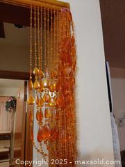 MaxSold Auction: Amber-colored crystal or glass beaded curtain for doorway - London (Ontario, Canada) PARTNER MANAGED Estate Sale Online Auction - Alayne Crescent