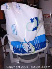 MaxSold Auction: Folding steel commode and TENA pads - London (Ontario, Canada) PARTNER MANAGED Estate Sale Online Auction - Alayne Crescent