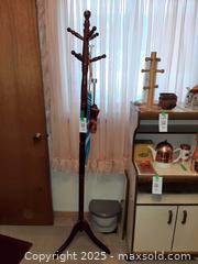 MaxSold Auction: Freestanding wooden coat rack in a cherry finish - London (Ontario, Canada) PARTNER MANAGED Estate Sale Online Auction - Alayne Crescent