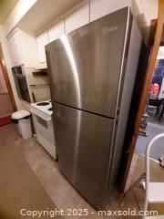 MaxSold Auction: Midea stainless steel top-freezer refrigerator - London (Ontario, Canada) PARTNER MANAGED Estate Sale Online Auction - Alayne Crescent