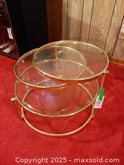 MaxSold Auction: Vintage Milo Baughman-style three-tiered brass and glass swivel coffee table - London (Ontario, Canada) PARTNER MANAGED Estate Sale Online Auction - Alayne Crescent