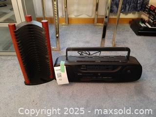 MaxSold Auction: Yorox portable AM/FM cassette player boombox and a vertical CD storage rack - London (Ontario, Canada) PARTNER MANAGED Estate Sale Online Auction - Alayne Crescent