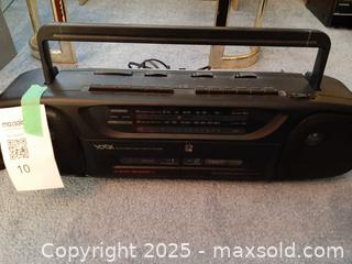 MaxSold Auction: Yorox portable AM/FM cassette player boombox and a vertical CD storage rack - London (Ontario, Canada) PARTNER MANAGED Estate Sale Online Auction - Alayne Crescent