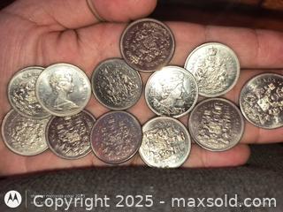MaxSold Auction: lot of 12 Canadian 50 cent coins lot - South Frontenac (Ontario, Canada) SELLER MANAGED Downsizing Online Auction - Battersea Road