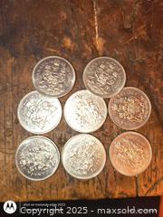 MaxSold Auction: Lot of 8 Canada 50 cent coins - South Frontenac (Ontario, Canada) SELLER MANAGED Downsizing Online Auction - Battersea Road