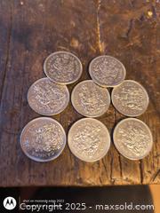 MaxSold Auction: Lot of 8 Canada 50 cent coins - South Frontenac (Ontario, Canada) SELLER MANAGED Downsizing Online Auction - Battersea Road