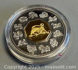 MaxSold Auction: 2004 Lunar Royal Canadian Mint $15 Year 0f The Monkey STERLING SILVER Coin in Original Case - Toronto (Ontario, Canada) PARTNER MANAGED Reseller Online Auction - Queen Street West