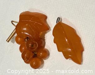 MaxSold Auction: (2) Vintage Signed Russian Amber Brooches  - Toronto (Ontario, Canada) PARTNER MANAGED Reseller Online Auction - Queen Street West