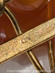 MaxSold Auction: (2) Vintage Signed Russian Amber Brooches  - Toronto (Ontario, Canada) PARTNER MANAGED Reseller Online Auction - Queen Street West