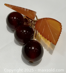 MaxSold Auction: Vintage Signed Russian Amber Cherry Brooch - Toronto (Ontario, Canada) PARTNER MANAGED Reseller Online Auction - Queen Street West