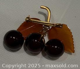 MaxSold Auction: Vintage Signed Russian Amber Cherry Brooch - Toronto (Ontario, Canada) PARTNER MANAGED Reseller Online Auction - Queen Street West