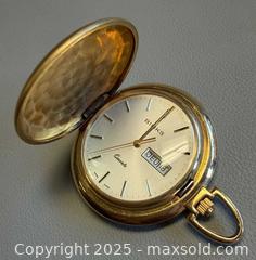 MaxSold Auction: Vintage Swiss Made BIRKS Date Pocket Watch  in Working Condition - Toronto (Ontario, Canada) PARTNER MANAGED Reseller Online Auction - Queen Street West