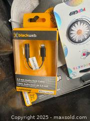 MaxSold Auction: Content of the Bin ( Optical Cable Lightening Adapter and More ) as Pictured  - Brampton (Ontario, Canada) SELLER MANAGED Commercial Liquidation Online Auction - Strathearn Avenue