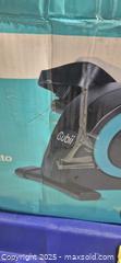 MaxSold Auction: Cubii Under-Desk Seated Mini Elliptical, Turquoise/Black - Markham (Ontario, Canada) PARTNER MANAGED Downsizing Online Auction - Mccowan Road (STORAGE)