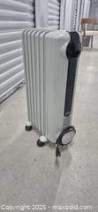 MaxSold Auction: DeLonghi TRRS0715E Oil-Filled Radiator Heater 1500W - Markham (Ontario, Canada) PARTNER MANAGED Downsizing Online Auction - Mccowan Road (STORAGE)
